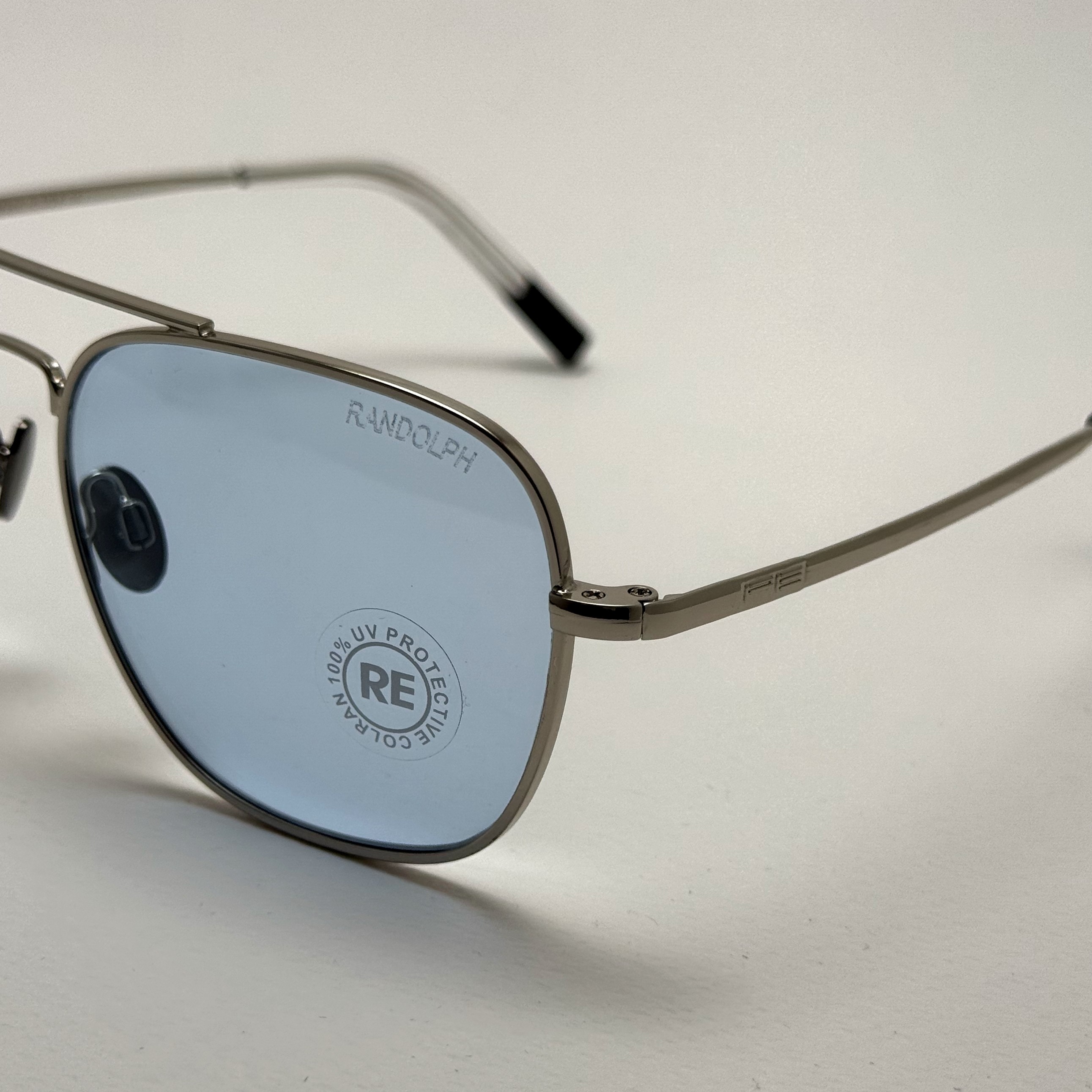 عینک شب و آفتابی خلبانی رندولف شیشه سنگ آبی آسمانی نقره ای فول پک RANDOLPH AVIATOR RE 58 24K WHITE GOLD