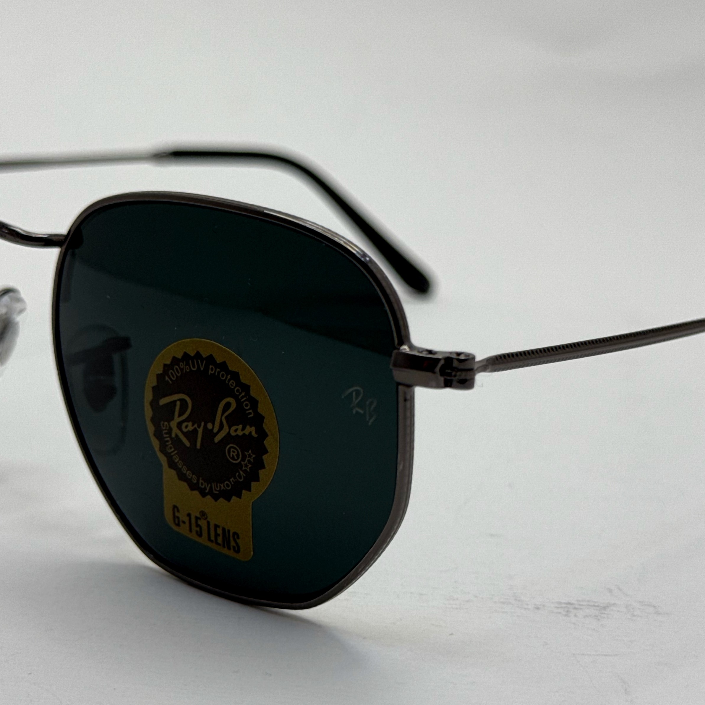 عینک ریبن هگزونال شیشه سنگ فریم نوک مدادی عدسی مشکی به همراه پک کامل ریبن کد Rayban RB 3548