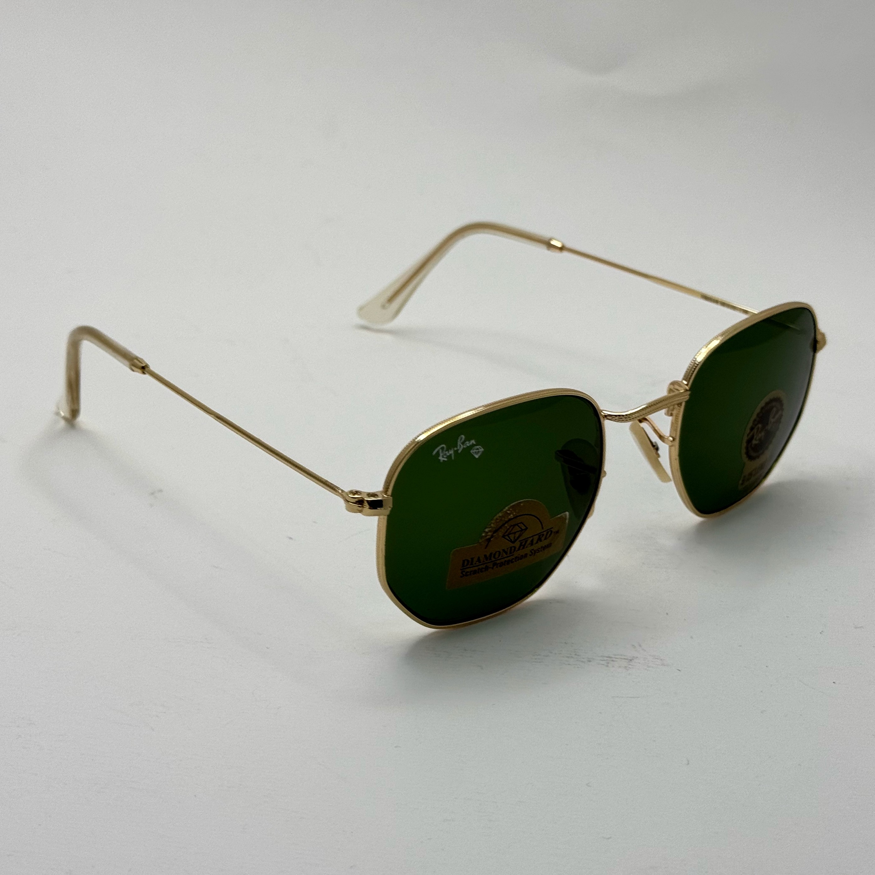 عینک ریبن هگزونال شیشه سنگ سیز فریم طلایی به همراه پک کامل ریبن کد Rayban RB 3548