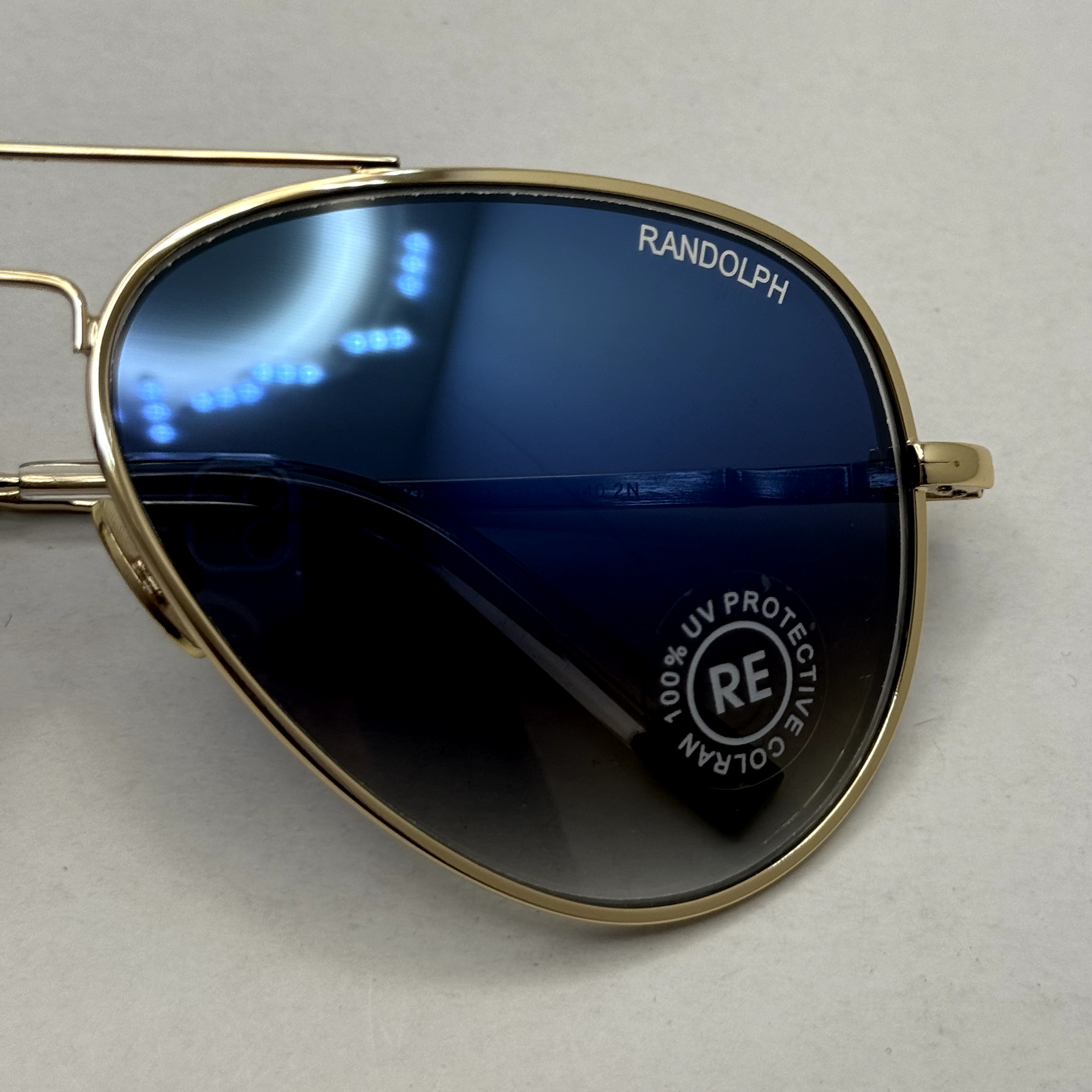 عینک آفتابی و شب خلبانی رندولف شیشه سنگ مدل کانکورد آبی فریم طلایی فول پک RANDOLPH CONCORD CR 231 24K GOLD