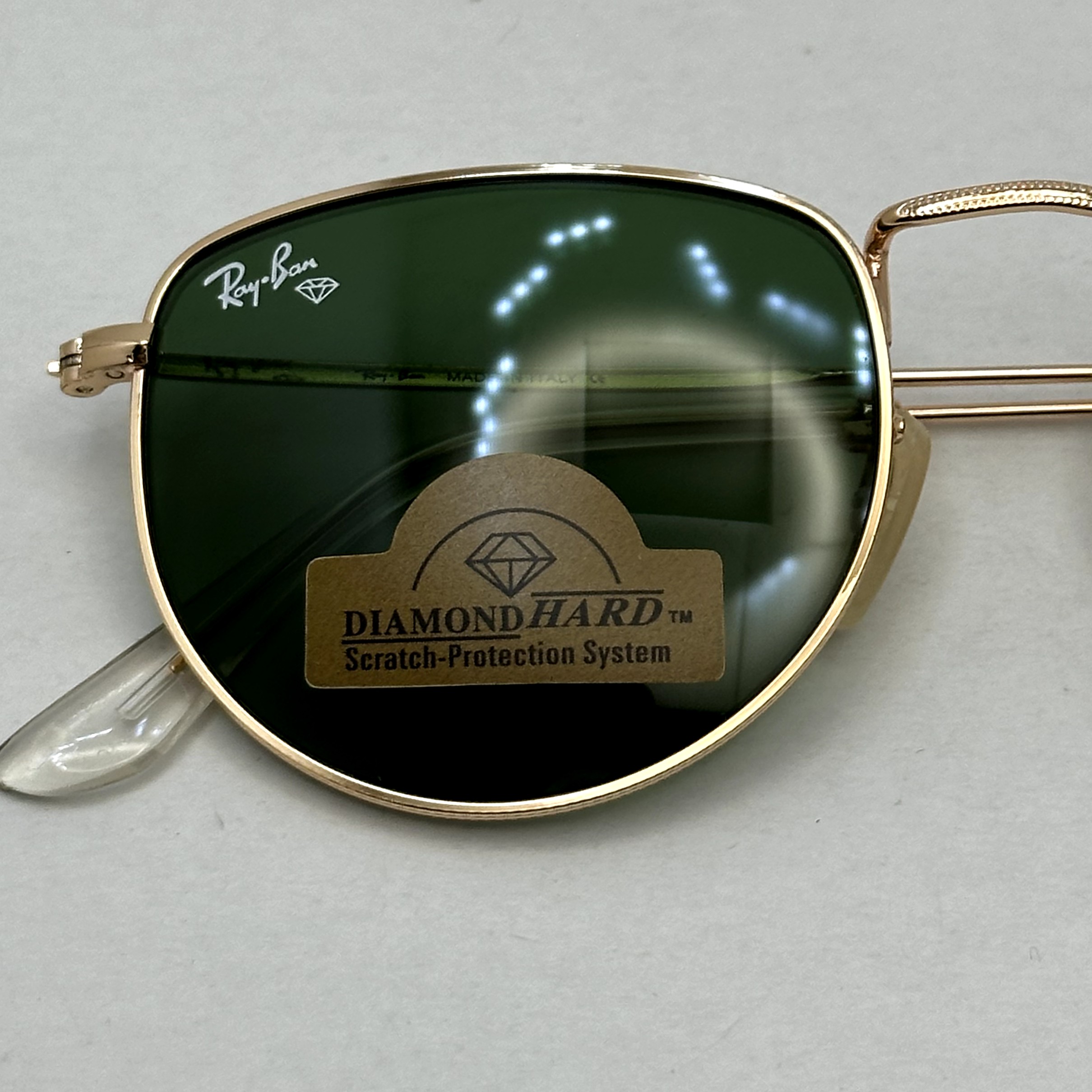 عینک آفتابی ریبن rayban شیشه سنگ سبز طلایی کد rb 3958 - فول پک