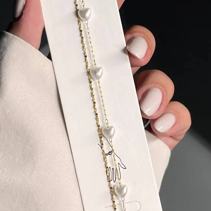 دستبند زنانه و دخترانه استیل طرح دولاین مروارید قلبی ضد حساسیت رنگ ثابت کد atk (پس کرایه)