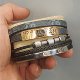 دستبند چرمی قفل و پلاک استیل مردانه طرح رولکس Rolex کیفیت چرم عالی تنوع طرح رنگ ثابت کد bn (پس کرایه)