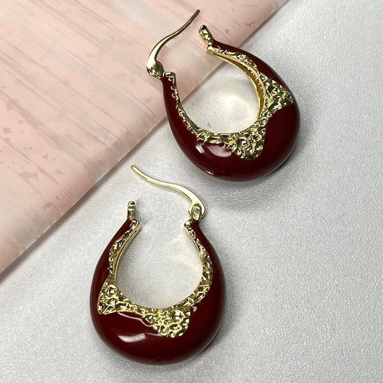 گوشواره طرح جواهری (میخ نقره) طرح مثلث نگین تنوع طرح رنگ ثابت کد tk (پس کرایه)