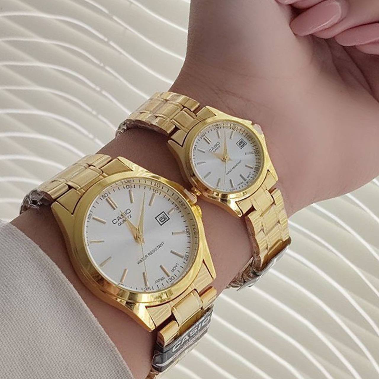 ست ساعت مچی زنانه و مردانه قیمت ست کاسیو استیل تاریخدار موتور ژاپن مارک معروف CASIO نمونه درجه یک ارسال رایگان