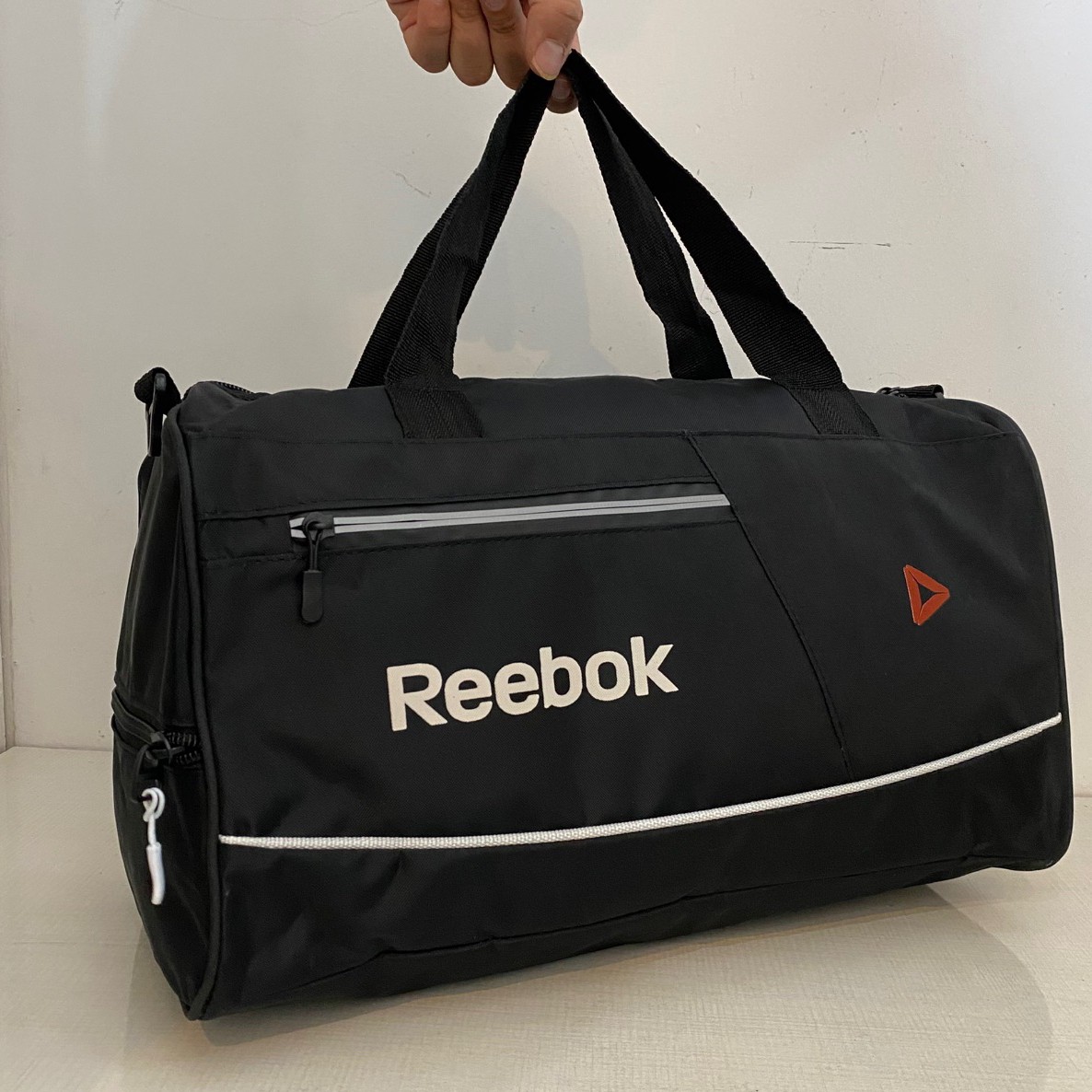 ساک ورزشی شبرنگ،rebok(پس کرایه)
