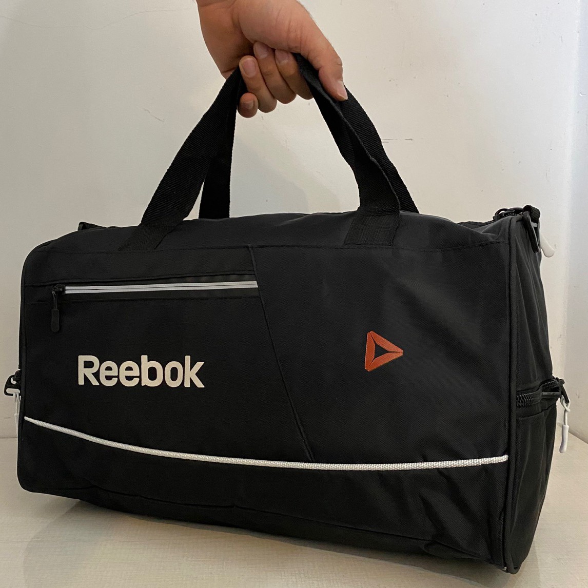 ساک ورزشی شبرنگ،rebok(پس کرایه)