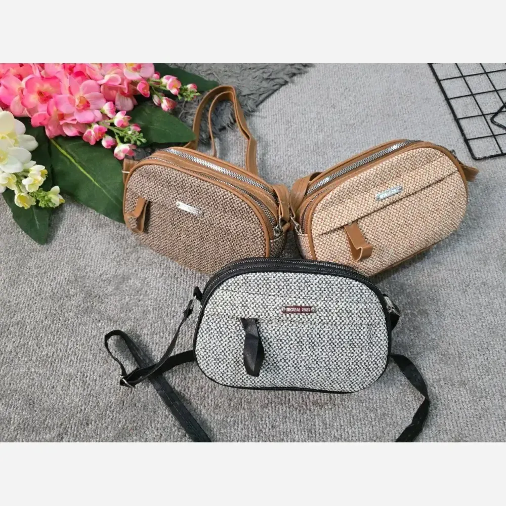 کیف زنانه آیدا جنس چرم طرح کنفی سه خونه (2)