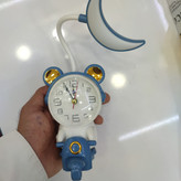 چراغ مطالعه شارژی و ساعت رومیزی فضانورد موتوری 1