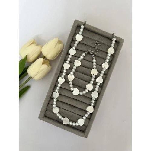 گردنبند و دستبند مروارید و صدف اشکال