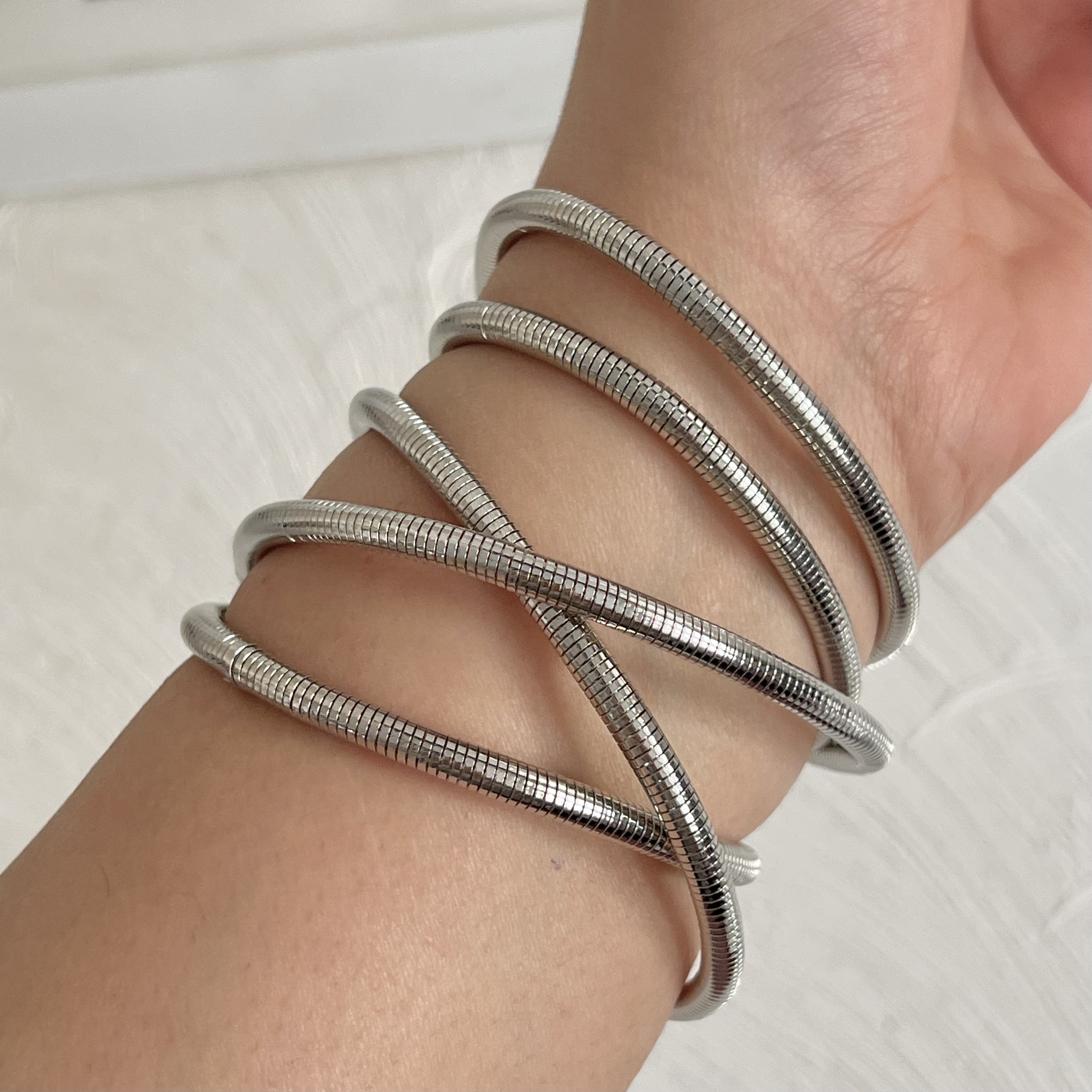 دستبند فشن ماری فنری منعطف استیل رنگ ثابت چند لاین